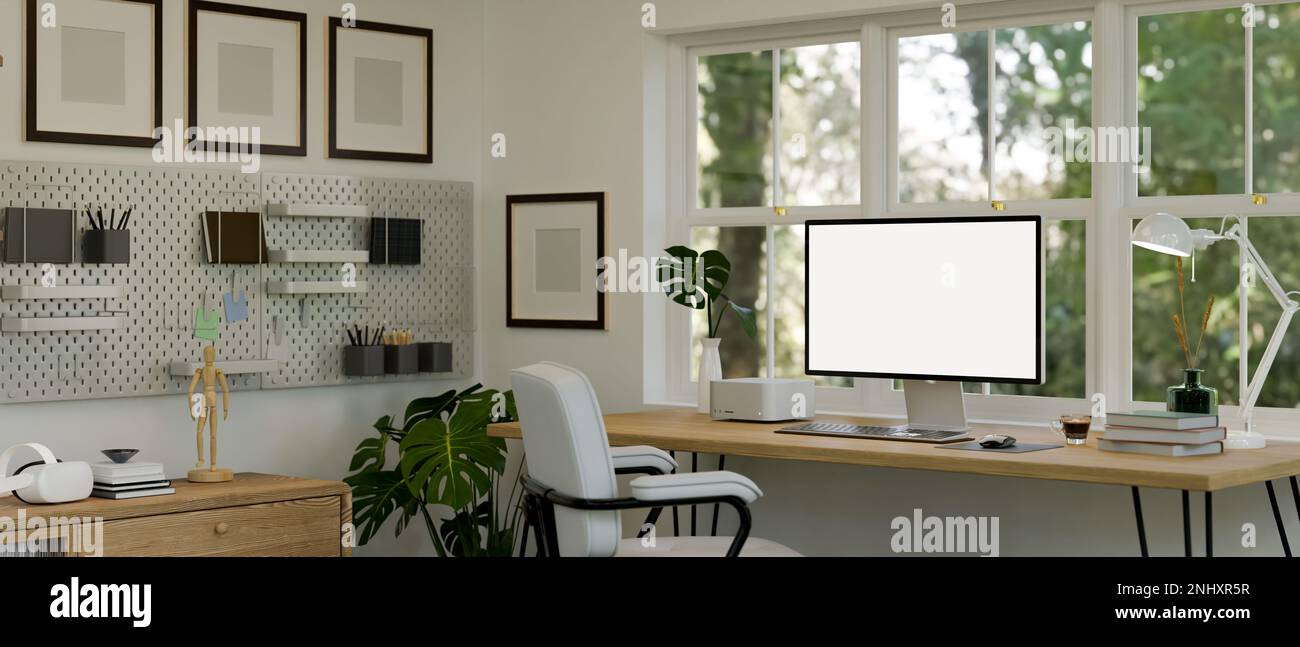 Beautiful white home office interior design with computer mockup on