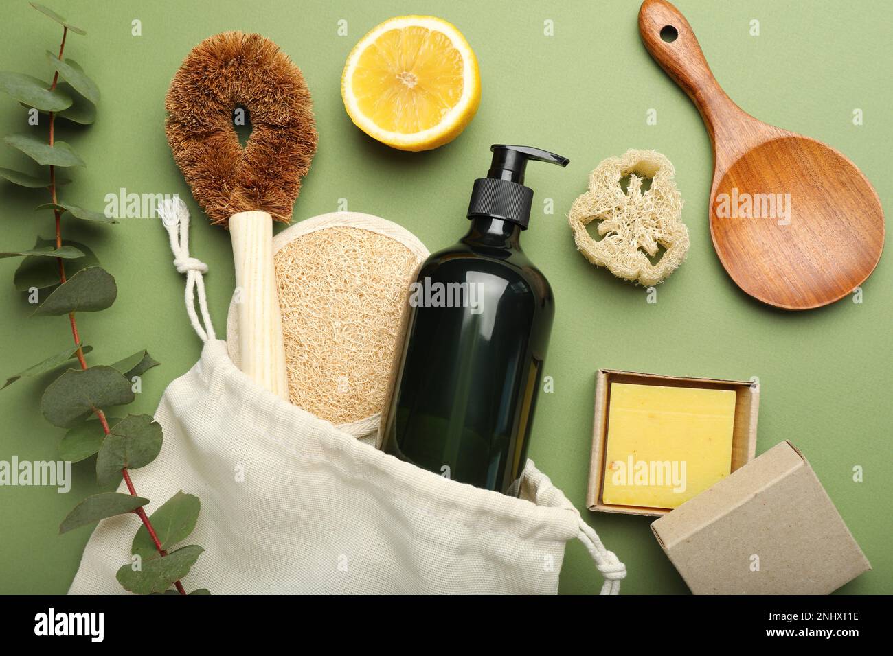 Flat lay composition with eco friendly products on green background ...
