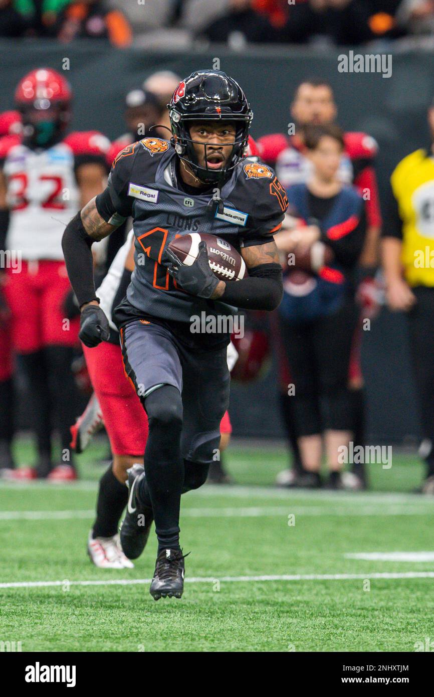 VANCOUVER, BC - NOVEMBER 06: B.C. Lions' Alexander Hollins (13) runs the  ball during their CFL Western Semi-Final game against the Calgary  Stampeders on November 6, 2022 at BC Place in Vancouver,