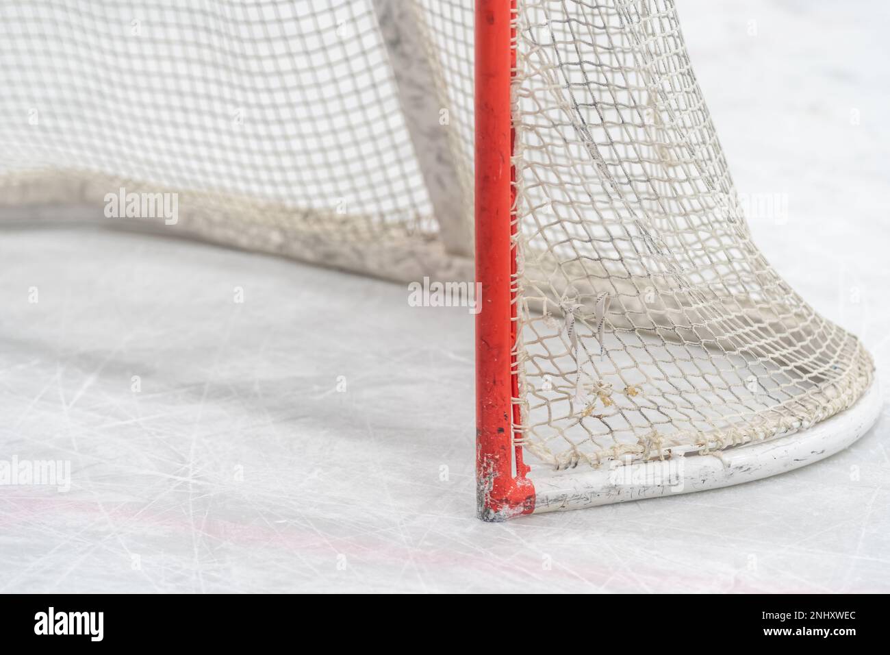 detail of a hockey goal on the ice Stock Photo Alamy