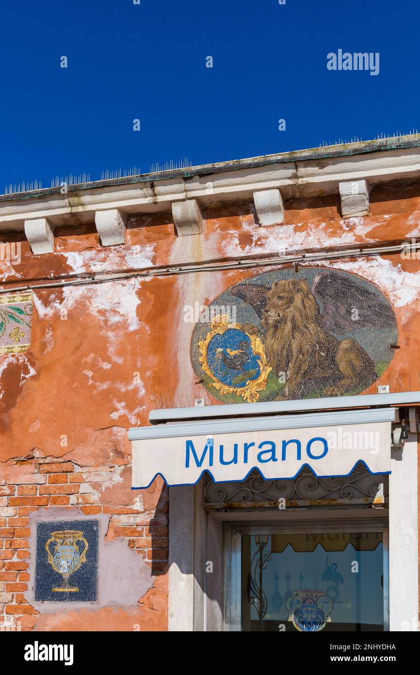 lion mosaic artwork on wall of Fine Murano Glass building at Murano, Venice, Italy in February Stock Photo