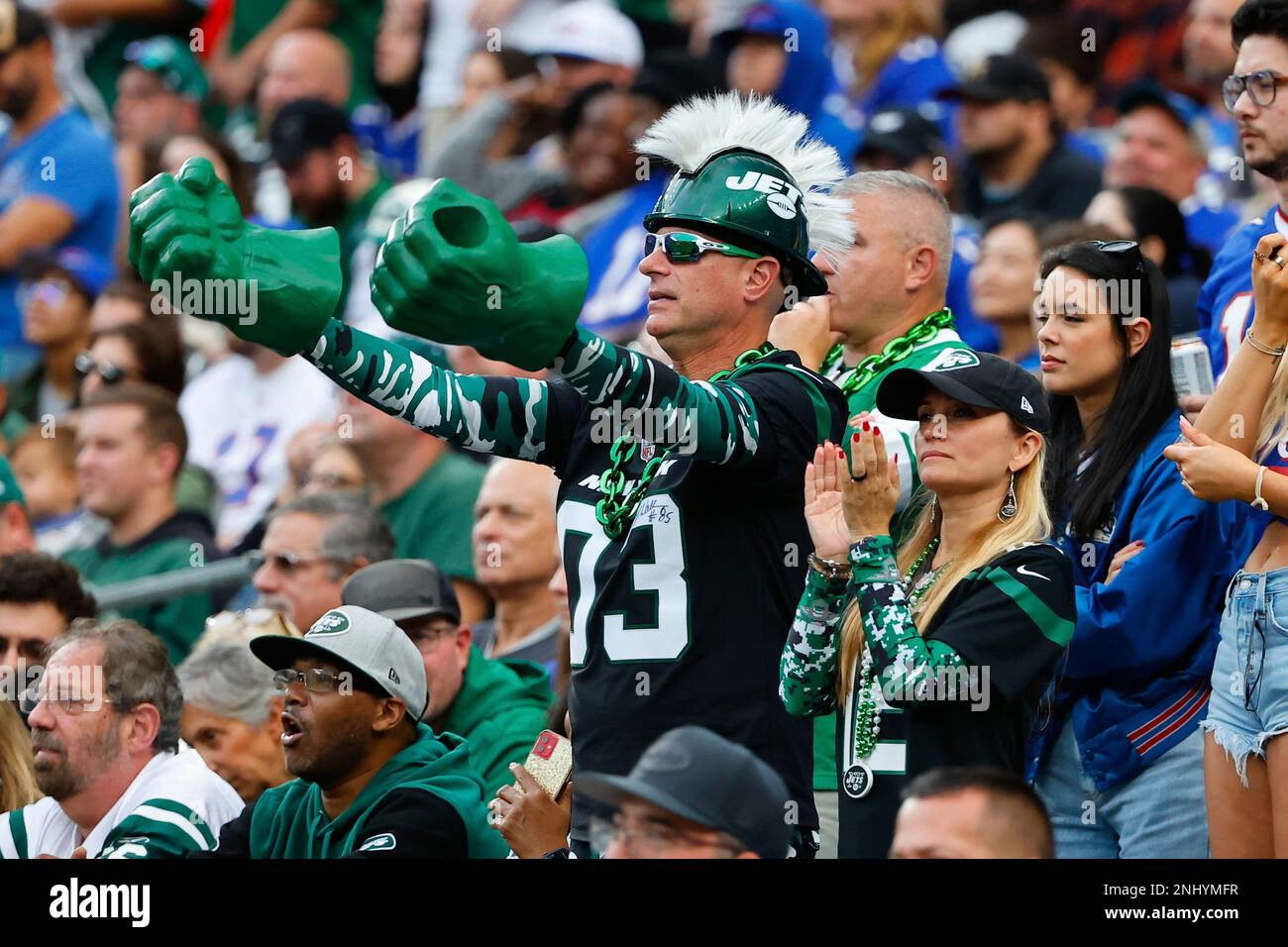 EAST RUTHERFORD NJ NOVEMBER 06 A New York Jets fan with Hulk hands stands and cheers during the National Football League game between the New York Jets and Buffalo Bills on