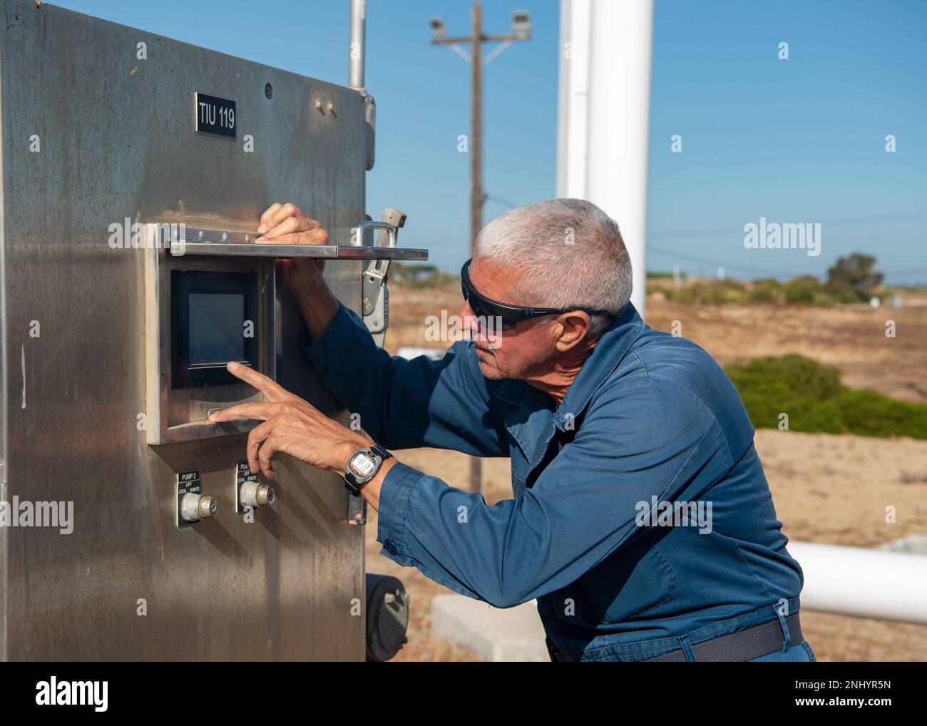 Avelino Lopez Rodriguez, Naval Supply Systems Command Fleet Logistics Center Sigonella fuels distribution systems operator, monitors fuel levels of one of two tanks undergoing repairs and modernization August 3, 2022 at Naval Station Rota, Spain. Now fully operational, the two tanks brought back to the installation an overall storage capacity of 15% greater storage capacity of ship propulsion fuel, called F76, and 9% greater storage capacity of aviation fuel, called JP8. Stock Photo