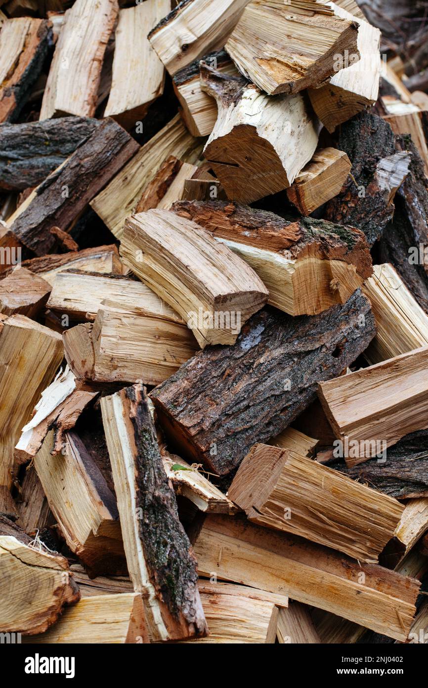 Axed wooden blocks. Blanks for kindling a fireplace and grill. Wooden pattern or background