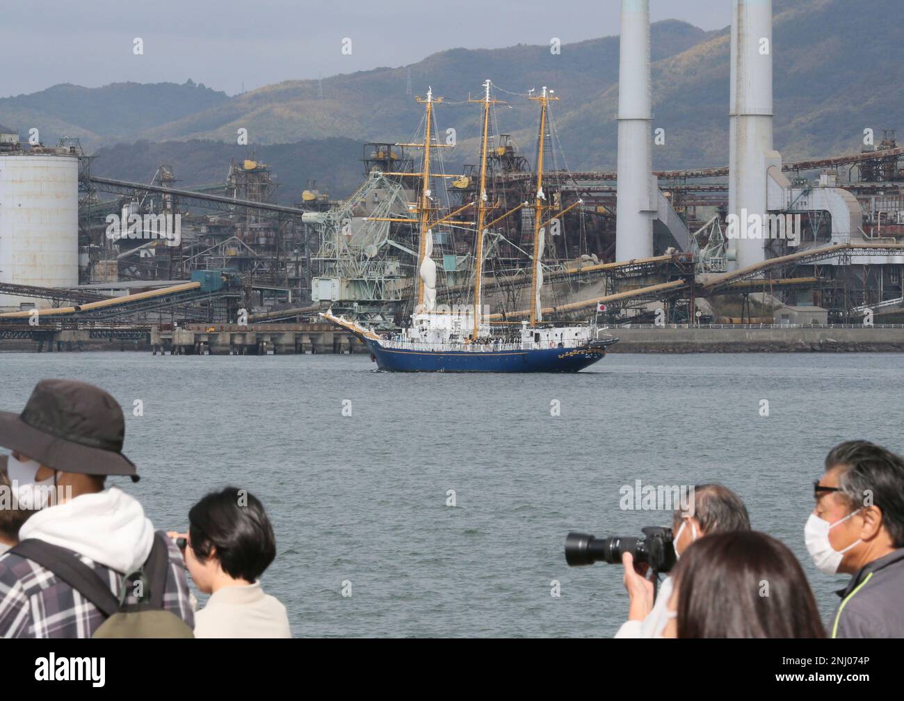 Sailing vessels gather at Tokuyama Kudamatsu Port during an event to  celebrate the 100th anniversary of