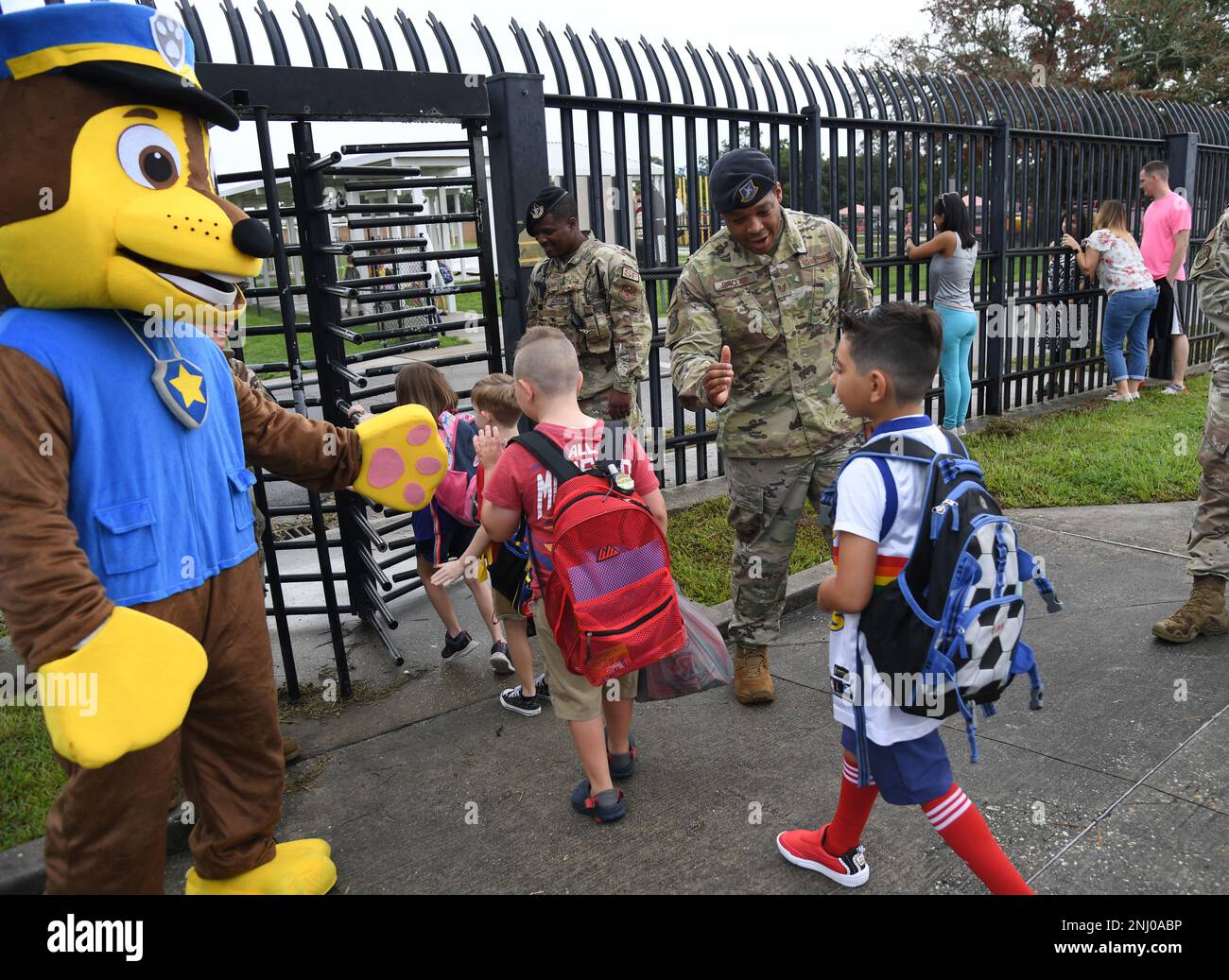 Members of the 81st Security Forces Squadron and Chase the Paw Patrol