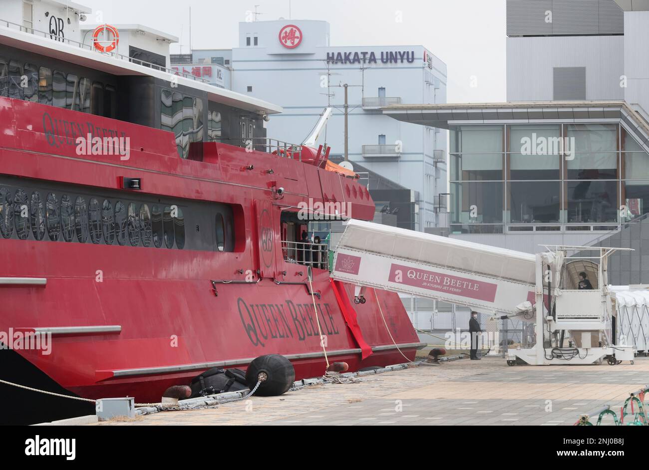 Passengers get on a new ship Queen Beatle operated by JR Kyushu Jet Ferry in Fukuoka City