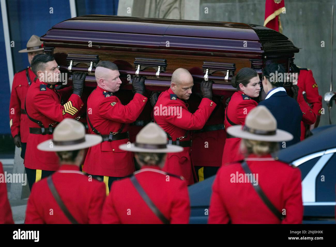 Royal Canadian Mounted Police Pallbearers Carry The Casket Of Rcmp