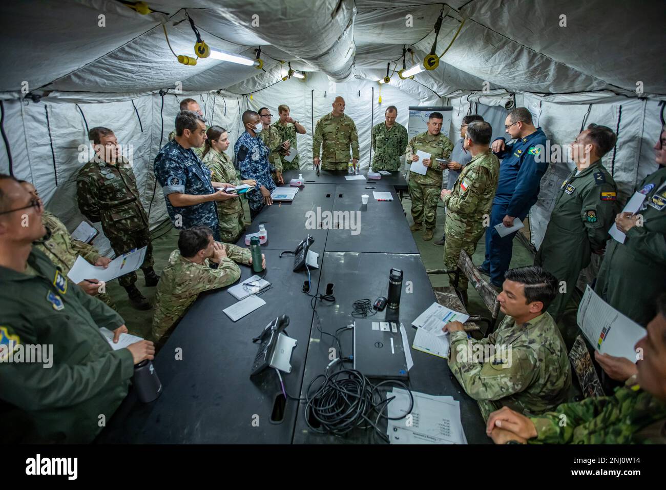 Military members from the U.S. and partner nation militaries conduct a ...