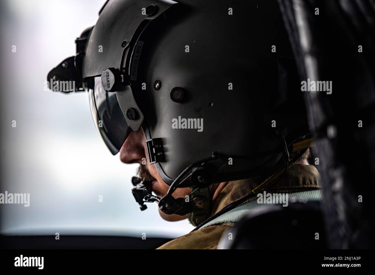 U.S. Army Capt. Andrew Pfeiffer, commander of Bravo Company, 1st Squadron, 214th General Support Aviation Battalion, 12th Combat Aviation Brigade, flies a Ch-47 Chinook helicopter during low level flight training at Tampere, Finland, Aug. 4, 2022. . 12th Combat Aviation Brigade is one of the units to support U.S. European Command theater strategy by demonstrating U.S. commitment to European Allies and Partners and highlighting U.S. capabilities to diverse audiences. 12 CAB is among other units assigned to V Corps, America's Forward Deployed Corps in Europe. They work alongside NATO Allies and Stock Photo