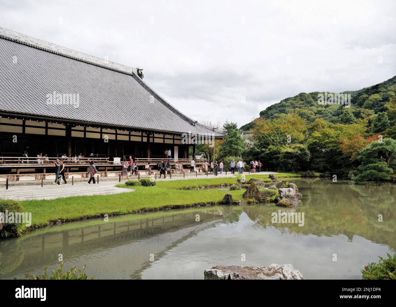 Kyoto, Japan - Sept, 2017: Garden with pond in front of Main pavilion Tenryu-ji Temple at Arashiyama Traditional Japanese Architecture. Sogenchi Pond Stock Photo