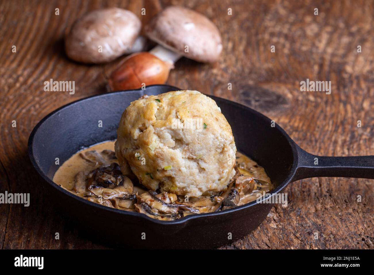 Bavarian Bread Dumpling In Mushroom Sauce Stock Photo