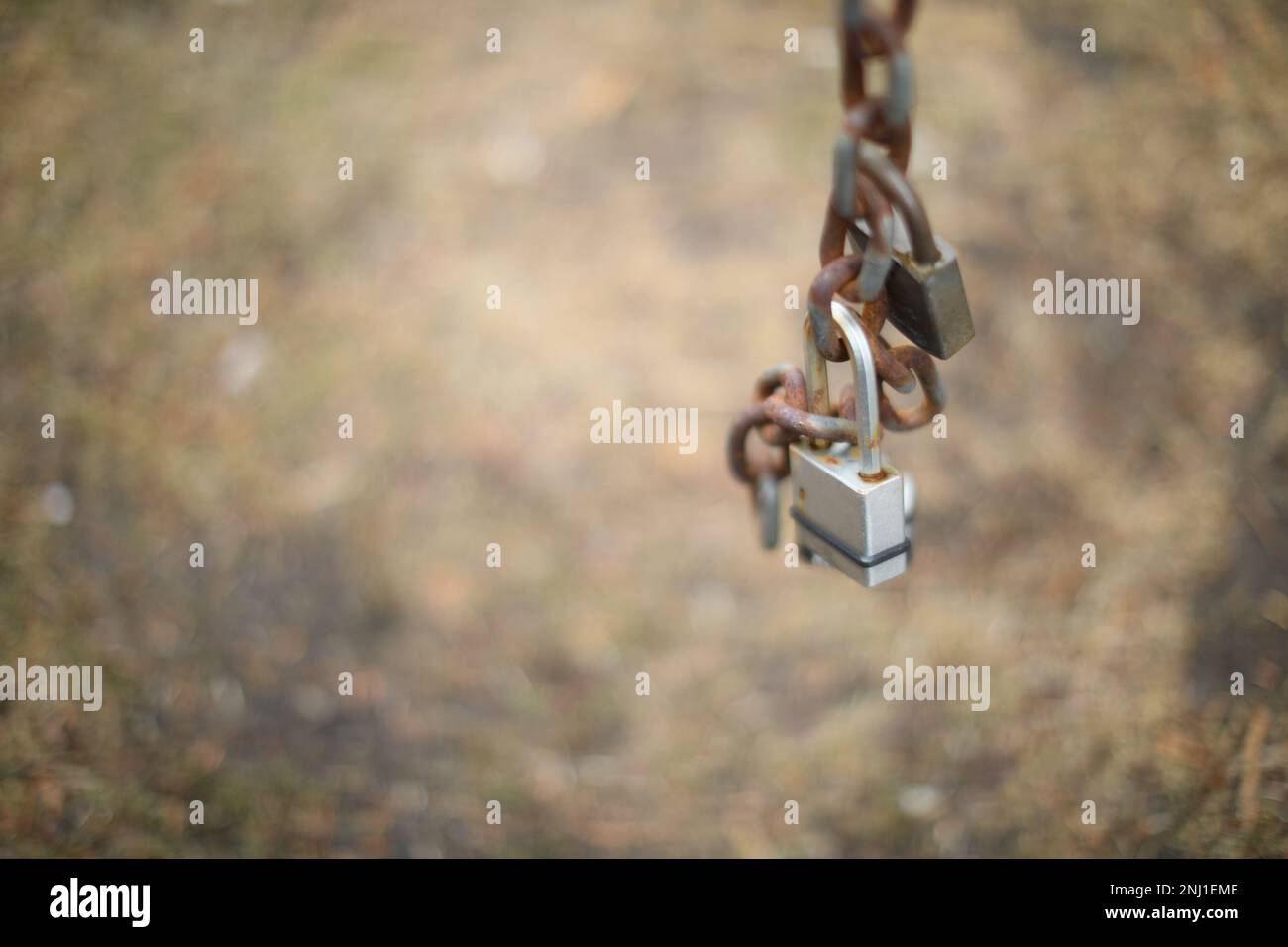 lock on door and chain giving protection with metal padlock Stock Photo ...