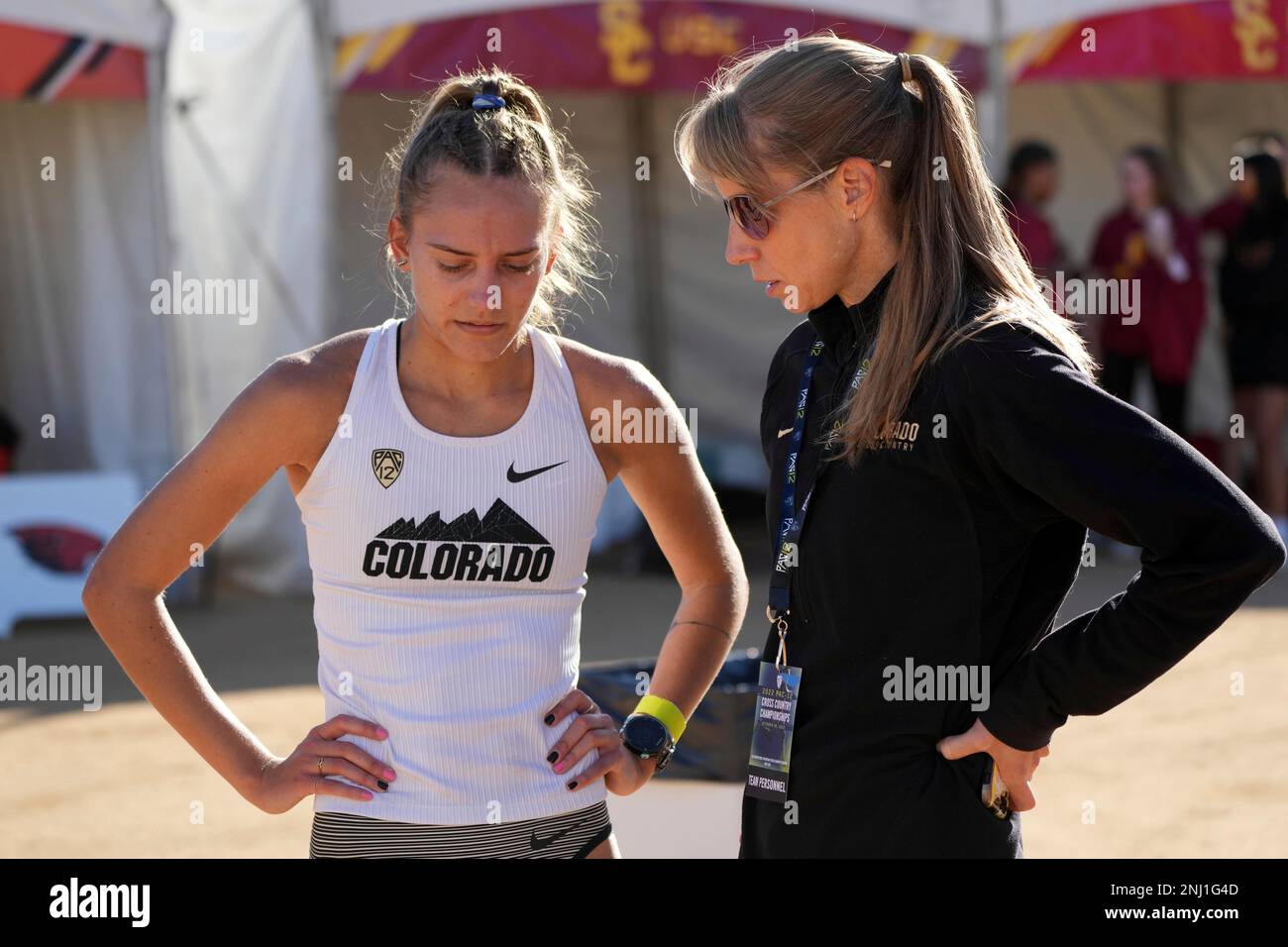 Colorado Buffaloes associate head coach Heather Burroughs (right 