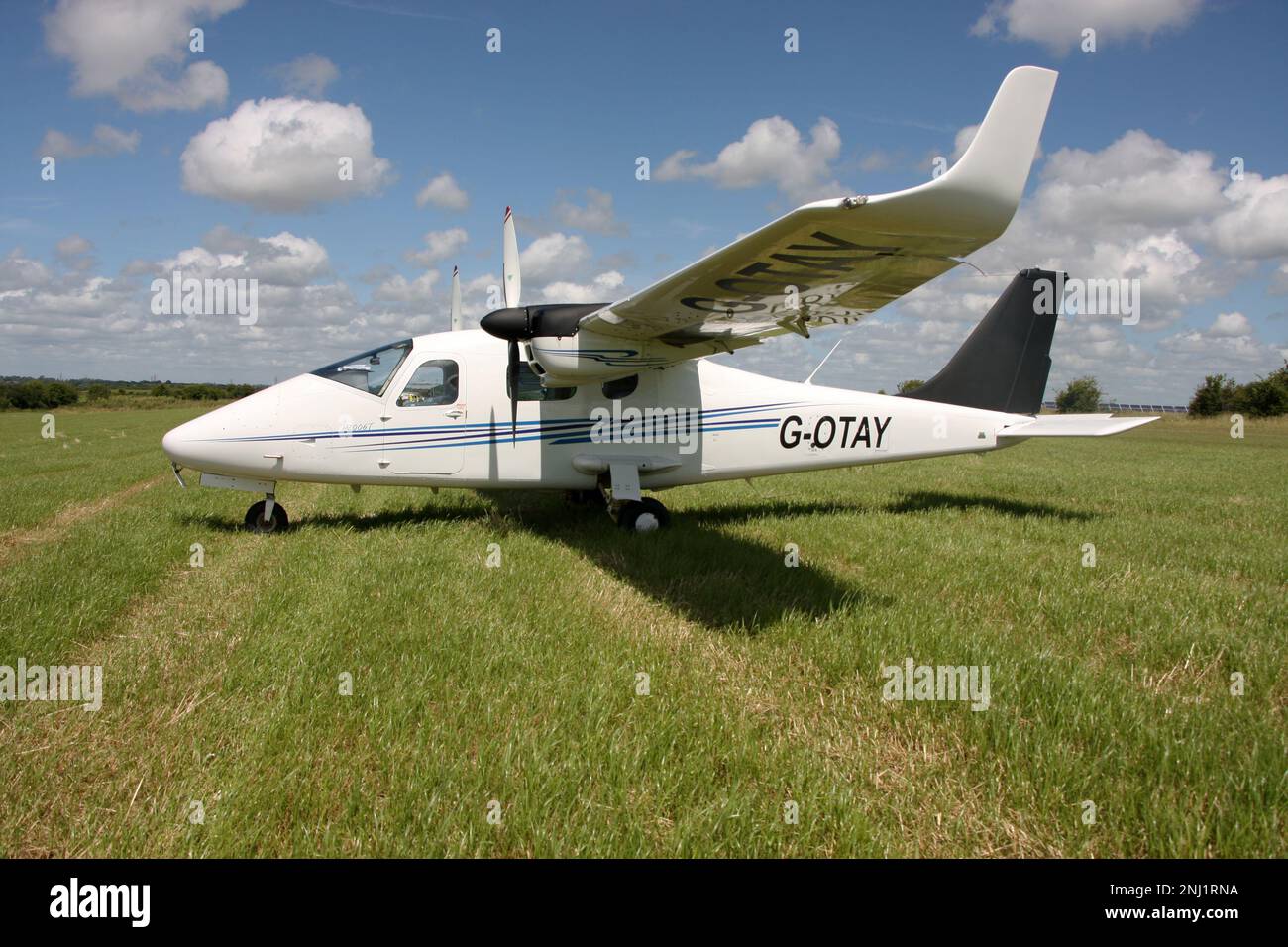 A Tecnam P2006T twin engine light aircraft at a private airfield in Sussex England Stock Photo