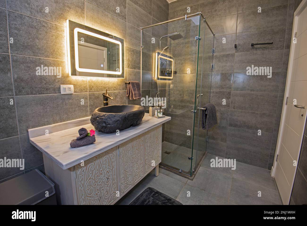 Interior design of a luxury show home bathroom with shower cubicle and ...