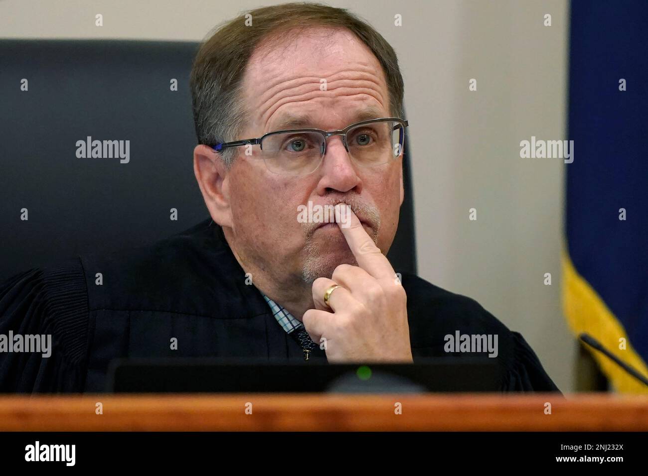 Judge Charles Temple listens during a hearing for Danielle Dauphinais