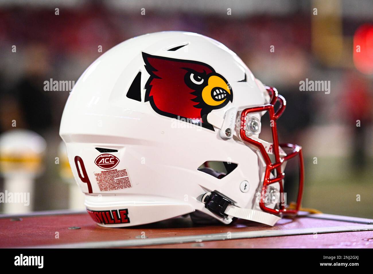 LOUISVILLE, KY - OCTOBER 22: A Louisville helmet sits on the sideline  during a college football game between the Pittsburgh Panthers and Louisville  Cardinals on October 22, 2022 at Cardinal Stadium in