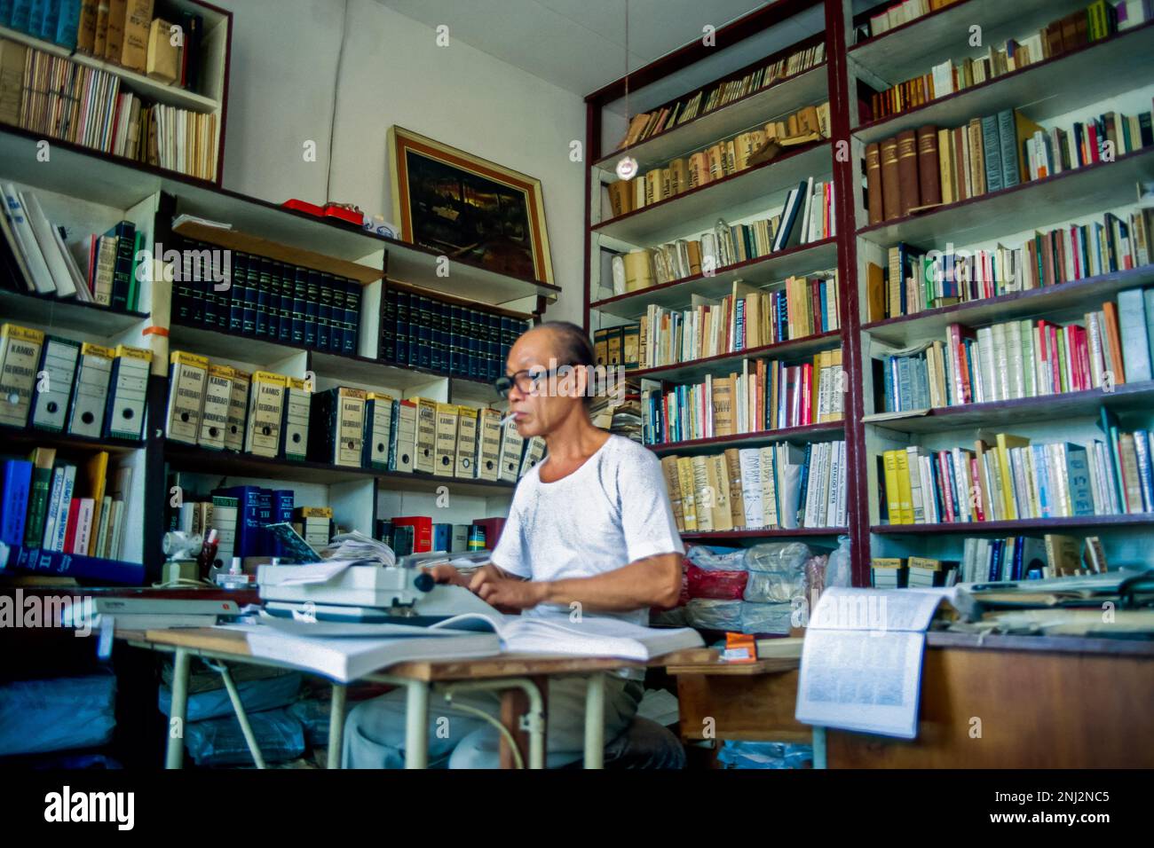 Indonesia, Jakarta. Indonesian author Pramoedya Ananta Toer in his study. Stock Photo