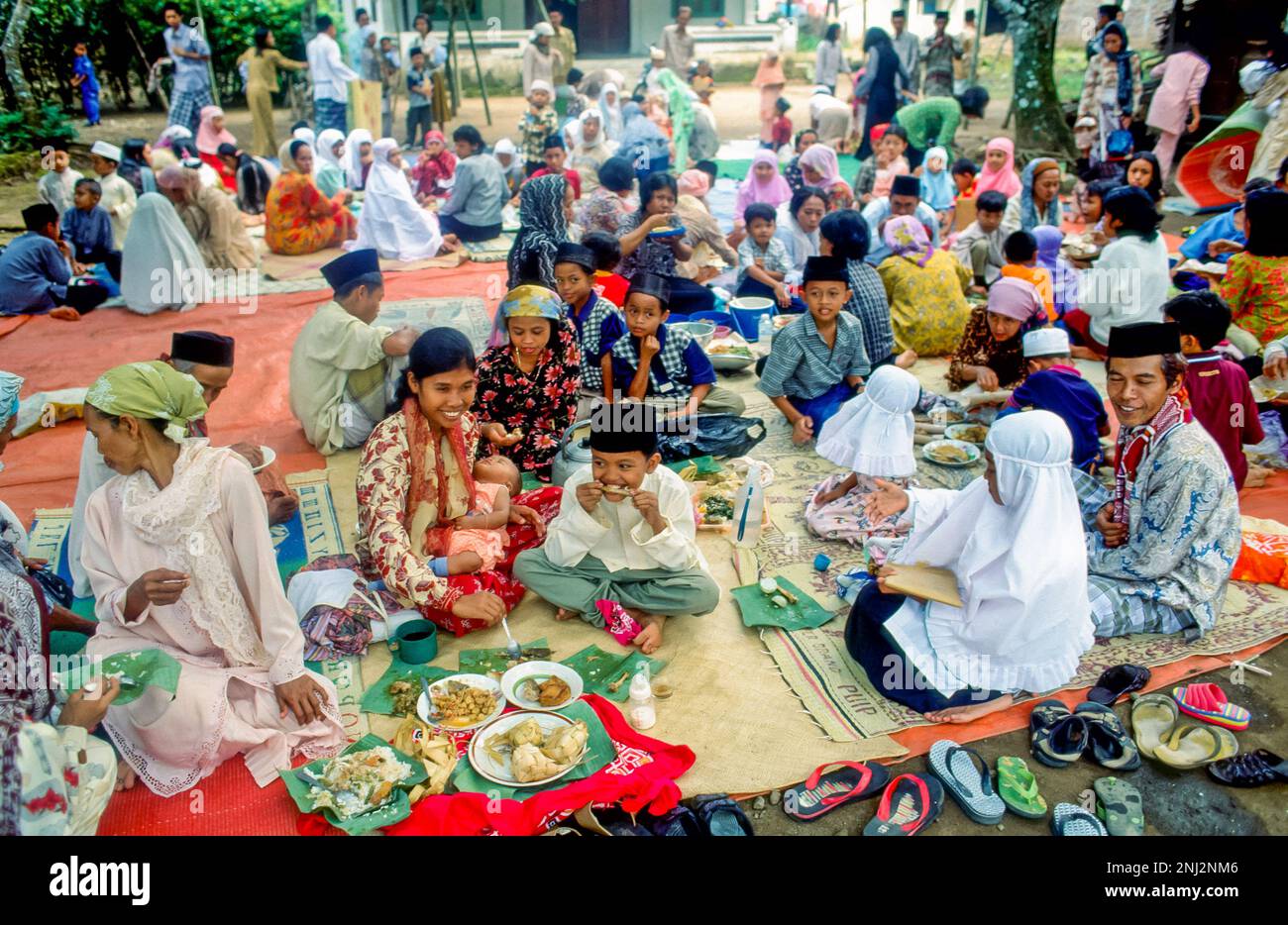 Indonesia, Yogyakarta. Families celebrating Idul Fitri (Eid) or sugar fest at the end of Ramadan. Stock Photo