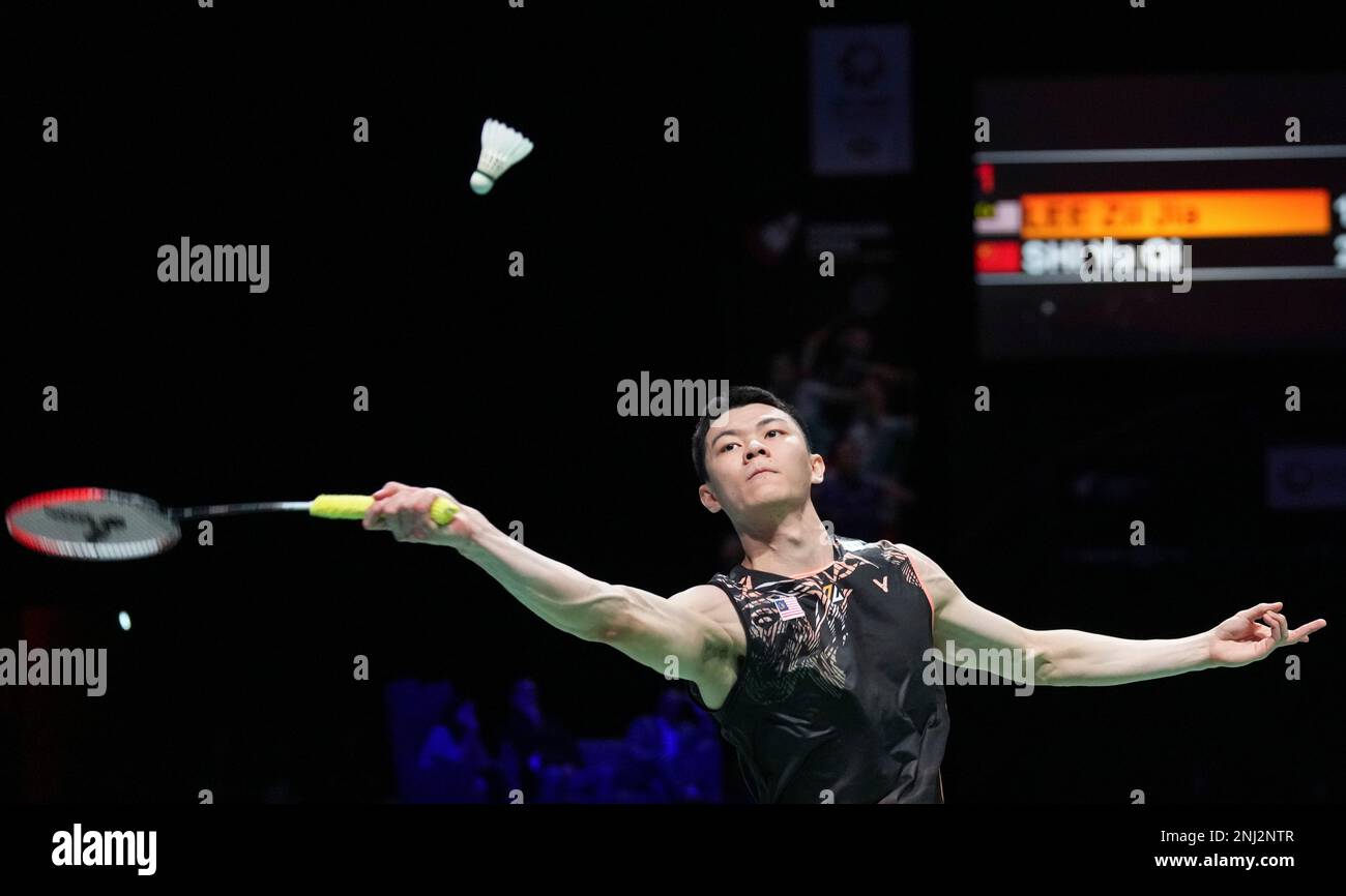 Malaysias Lee Zii Jia returns a shot to Chinas Shi Yuqi, during the mens singles finals of the Badminton Denmark Open, at the Jyske Bank Arena in Odense, Denmark, Sunday, Oct