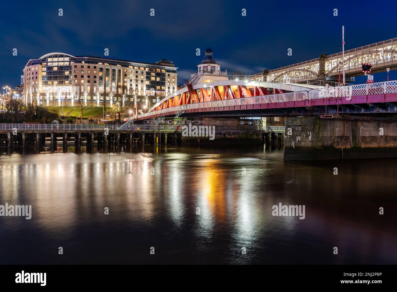Newcastle upon Tyne, UK Quayside at night, showing the Swing Bridge