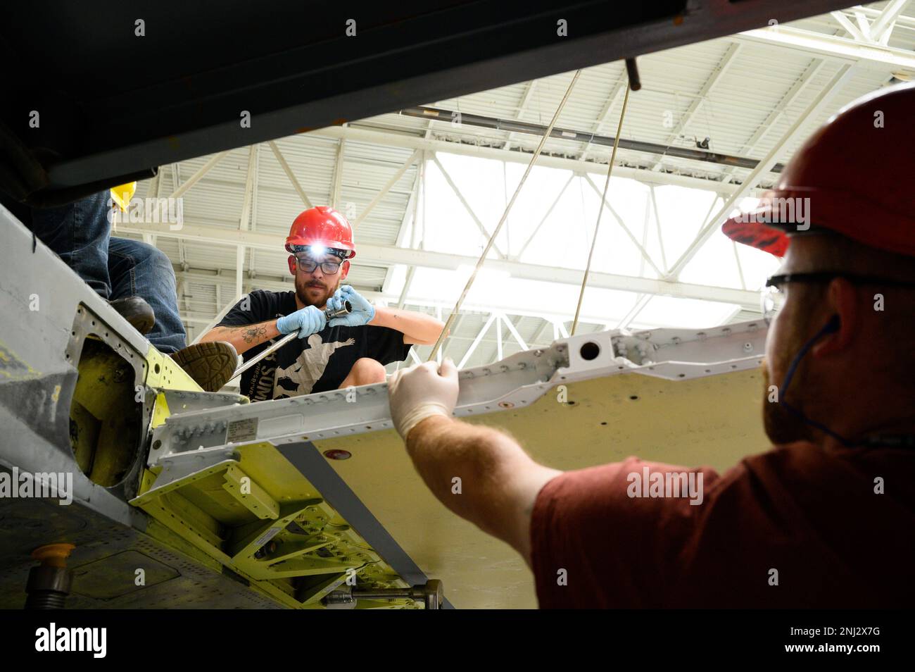 Cody Lupcho, 573rd Aircraft Maintenance Squadron, works a wing