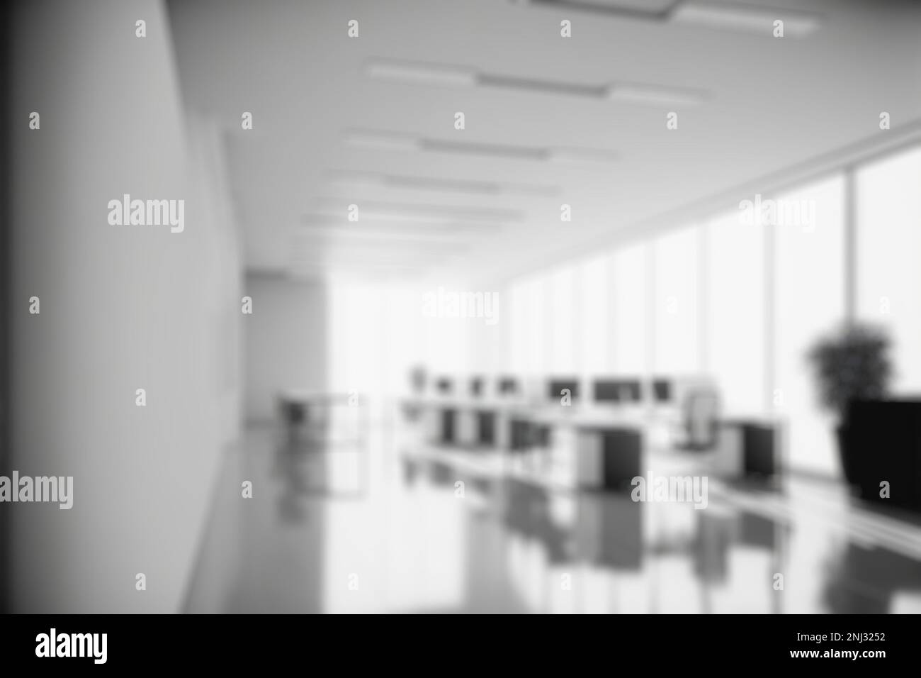 Blur background of empty modern office background . Workspace interior