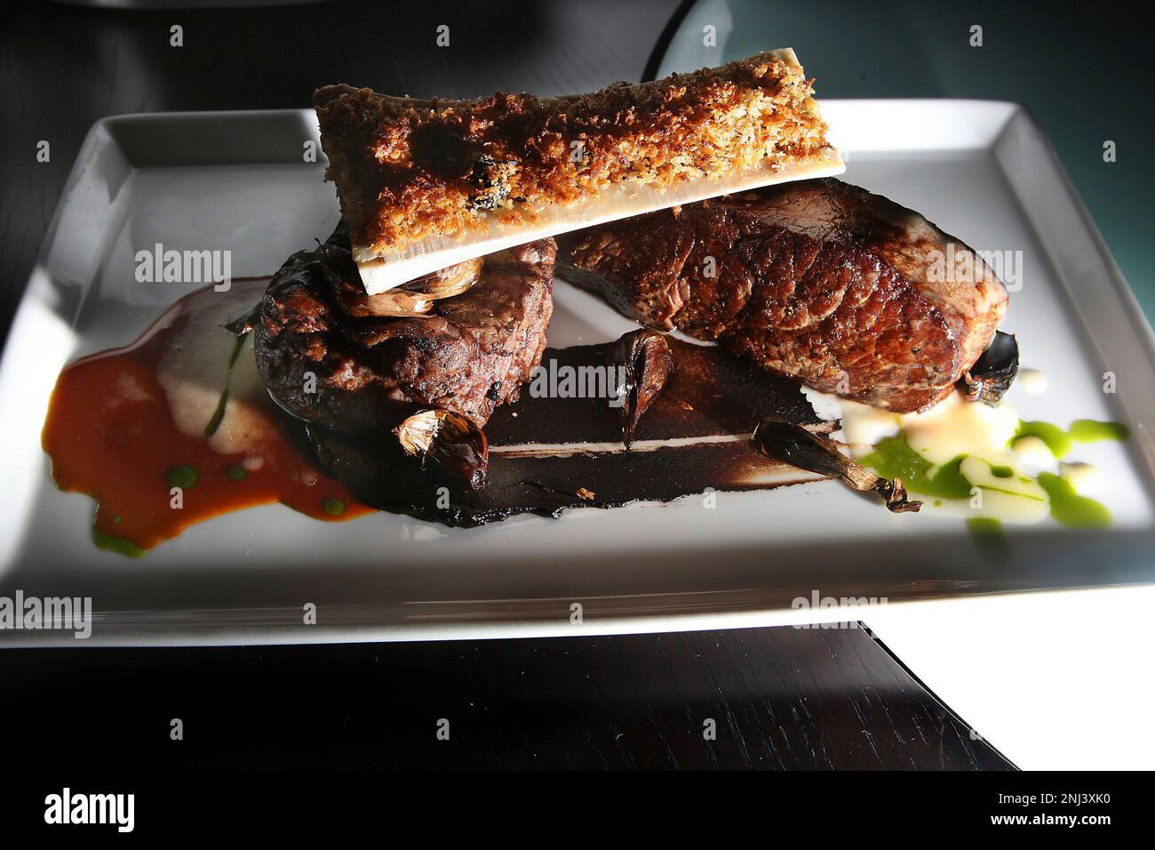Perfect Porterhouse--dry aged prime strip steak/petite filet mingnon/bone  marrow/black garlic persillade--at Alexander's in San Francisco, Calif., on  Thursday, January 20, 2011. (Liz Hafalia/San Francisco Chronicle via AP  Stock Photo - Alamy