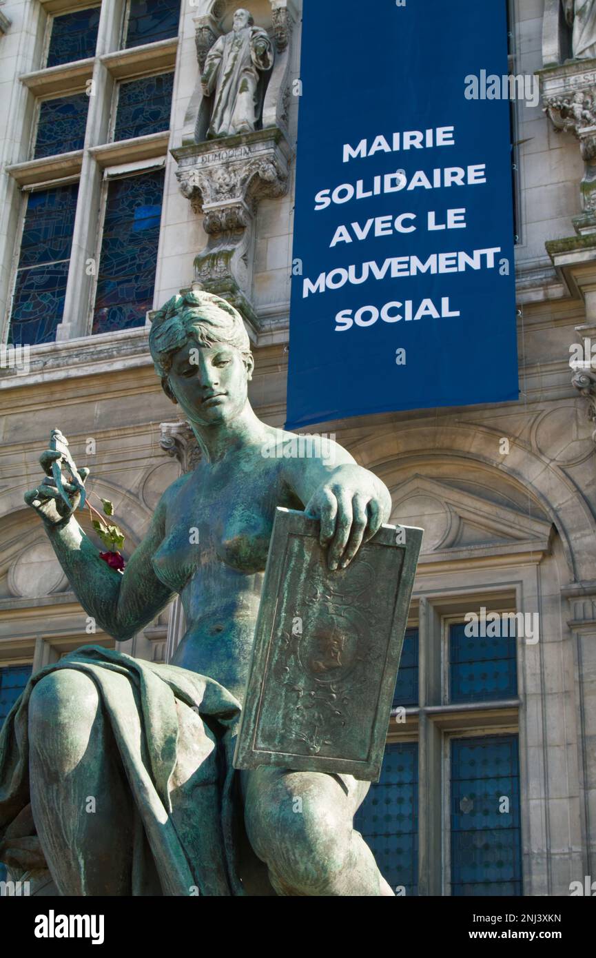 Banner Supporting The Social Movement, Protests Against Raising Of The Retirment Age Hanging From The Hotel De Ville With The Bronze Sculpture For Sci Stock Photo
