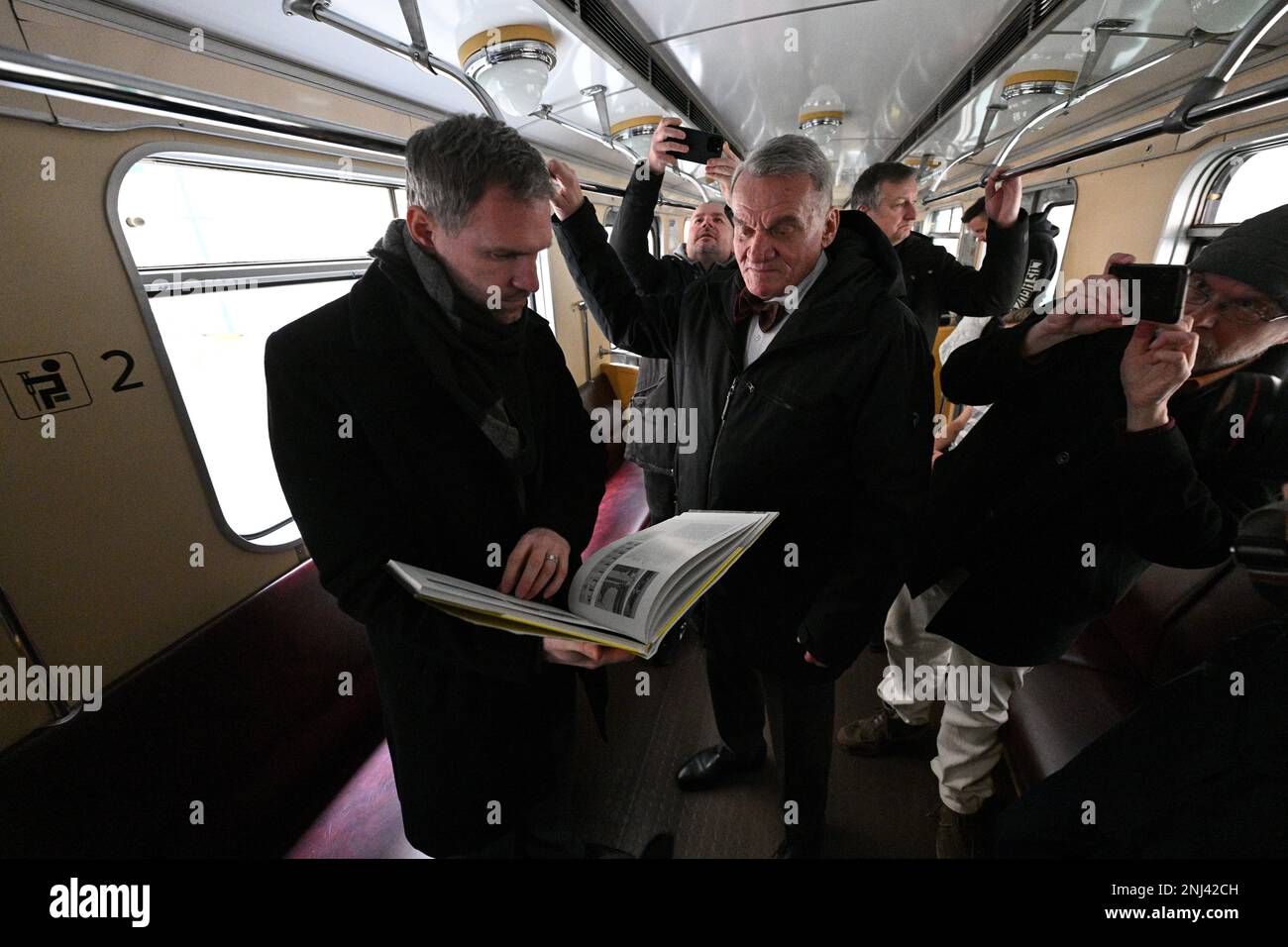 Prague, Czech Republic. 22nd Feb, 2023. Historical metro train dispatched for journalists form Vysehrad station on the occasion of 50th anniversary of Nusle bridge opening, with new Mayor Bohuslav Svoboda (ODS), centre, his first deputy Zdenek Hrib (Pirates), left, in Prague, Czech Republic, February 22, 2023. Credit: Michal Kamaryt/CTK Photo/Alamy Live News Stock Photo