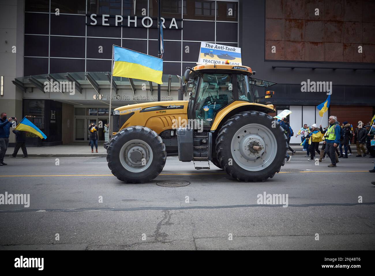 Tractors leading a Ukrainian march in Toronto Stock Photo - Alamy