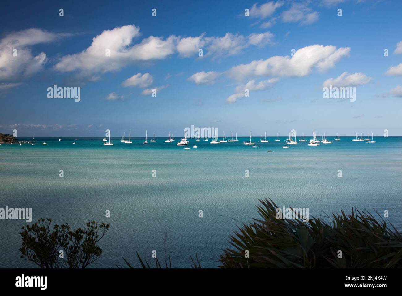 sailboats moored at Black Point, Exumas, Bahamas Stock Photo