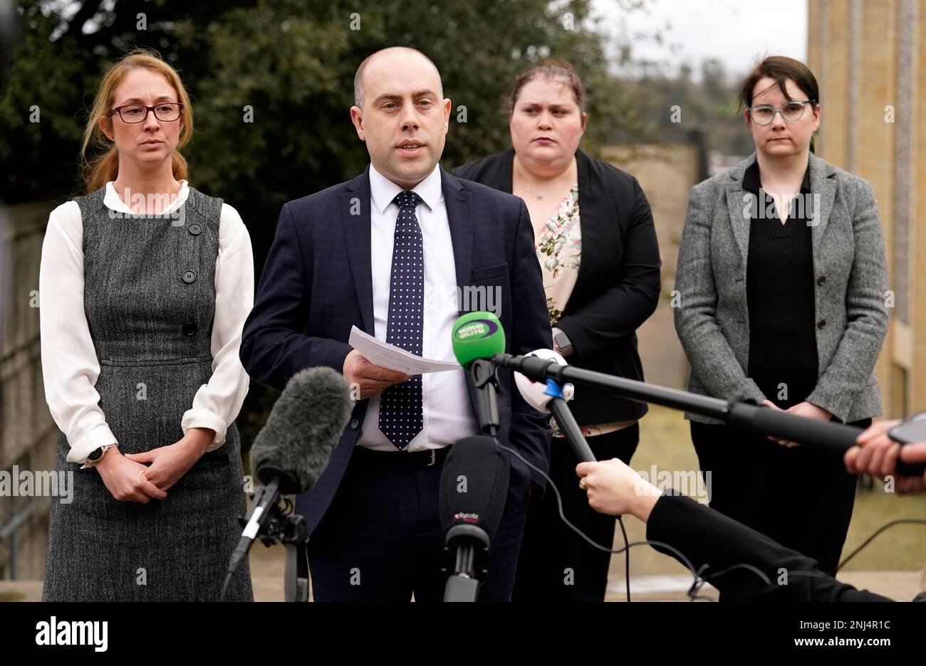 Hampshire Constabulary's DCI Rod Kenny (2nd left) reads a statement to the media outside Winchester Crown Court after Shaye Groves, 27, was sentenced to life with a minimum term of 23 years for the murder of 25-year-old Frankie Fitzgerald in Havant, Hampshire. Picture date: Wednesday February 22, 2023. Stock Photo