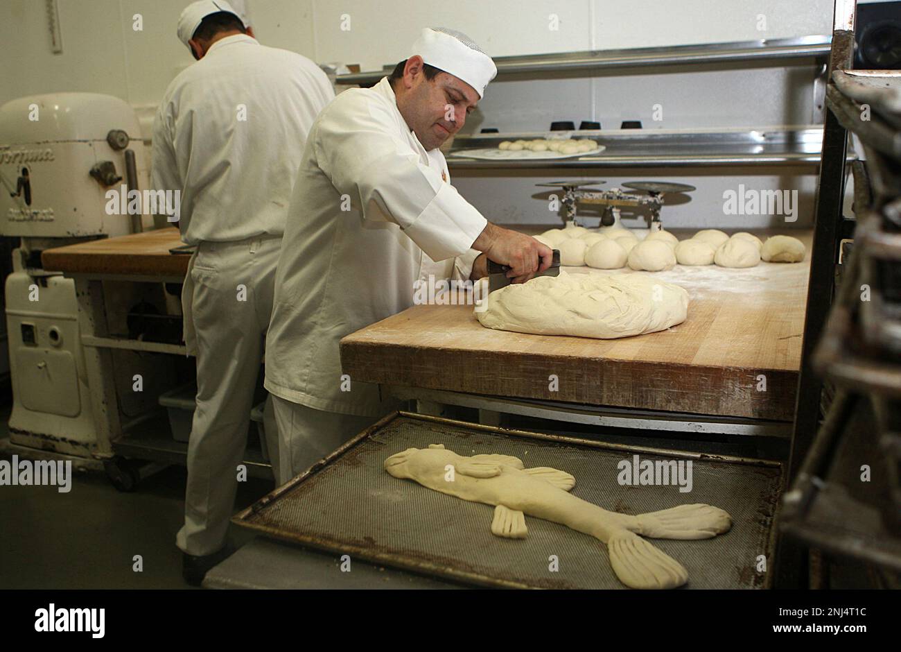 Master baker Fernando Padilla works on some dough at Boudin Bakery on