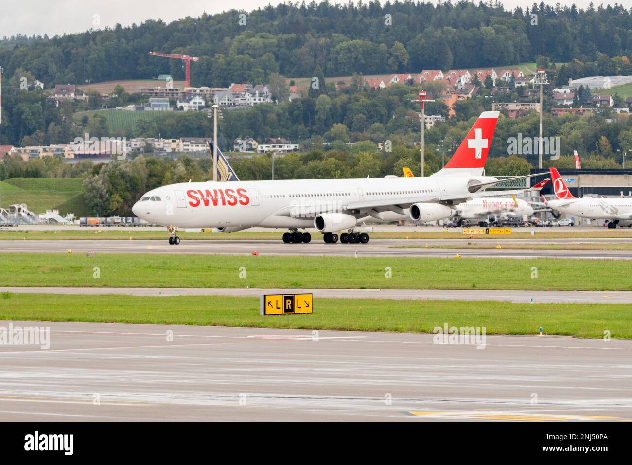 Zurich, Switzerland, September 27, 2022 Swiss international airlines Airbus A340-313X aircraft is taxiing to its position Stock Photo