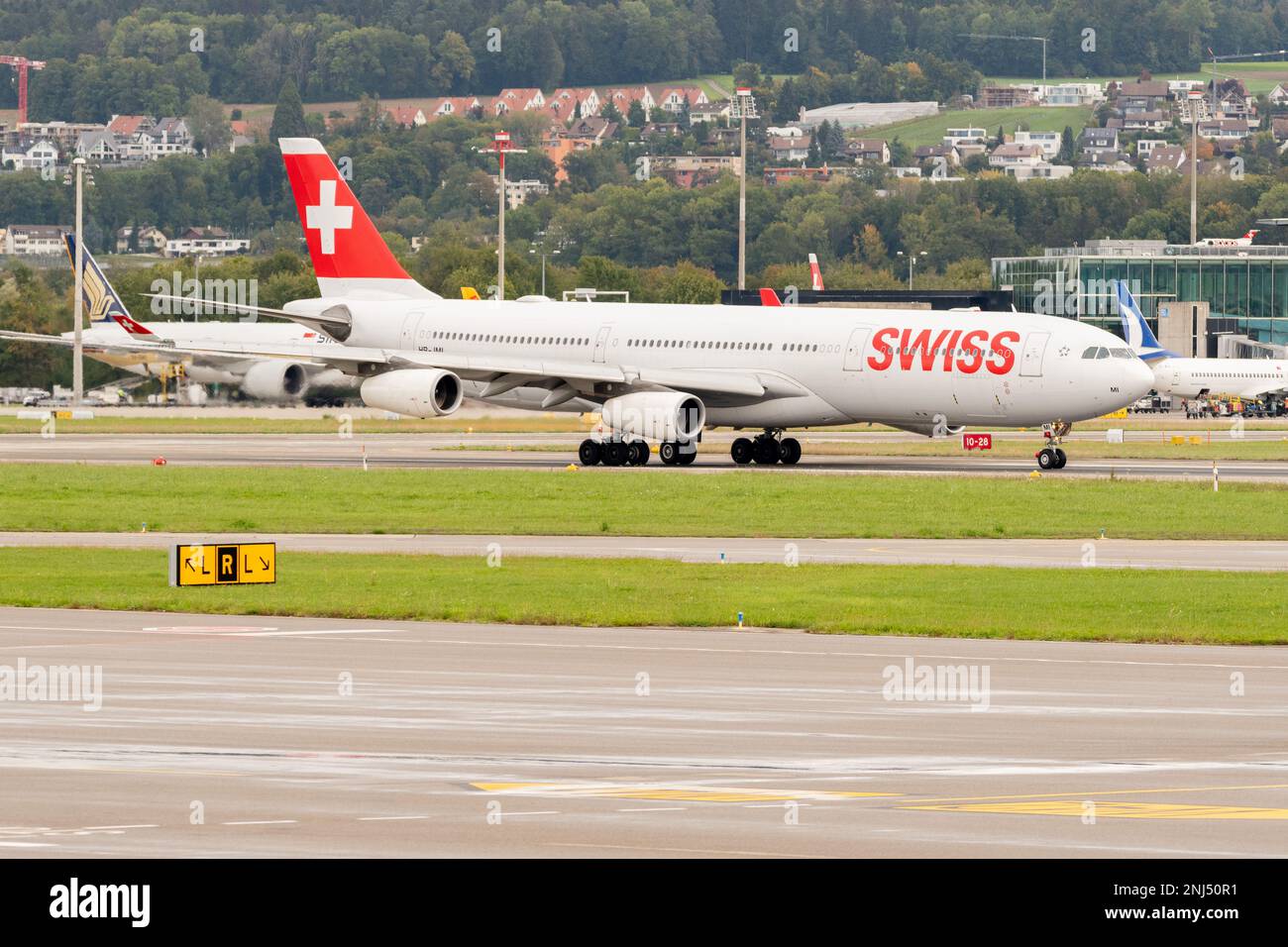 Zurich, Switzerland, September 27, 2022 Swiss international airlines Airbus A340-313X aircraft is taxiing to its position Stock Photo