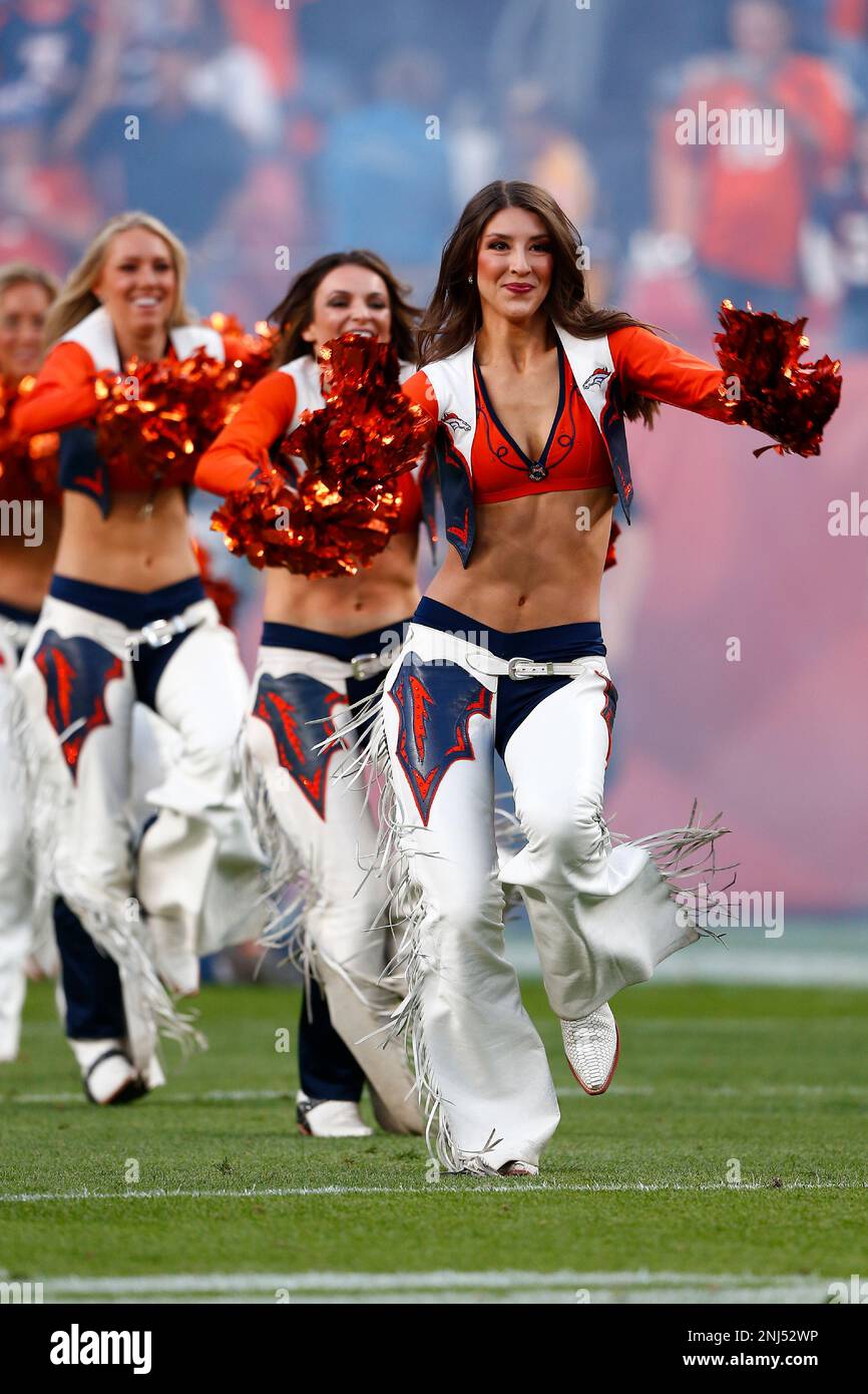 DENVER, CO - OCTOBER 06: A Denvers Broncos Cheerleader preforms during an  NFL game between the Indianapolis Colts and the Denver Broncos on October  06, 2022 at Empower Field at Mile High