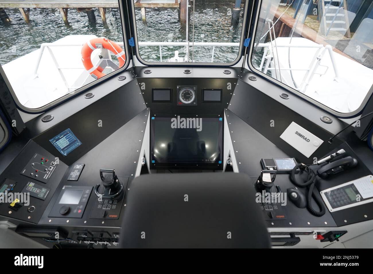 Kiel, Germany. 22nd Feb, 2023. View from the cockpit of the research vessel 'Wavelab' at the quay of the shipyard Gebr. Friedrich. The catamaran 'Wavelab' is to test autonomous shipping on the Kiel Fjord. The Federal Ministry of Transport has funded the project. The aim is to lay the foundations for ships to be able to sail on the Kiel Fjord without personnel at some point in the future. Credit: Marcus Brandt/dpa/Alamy Live News Stock Photo