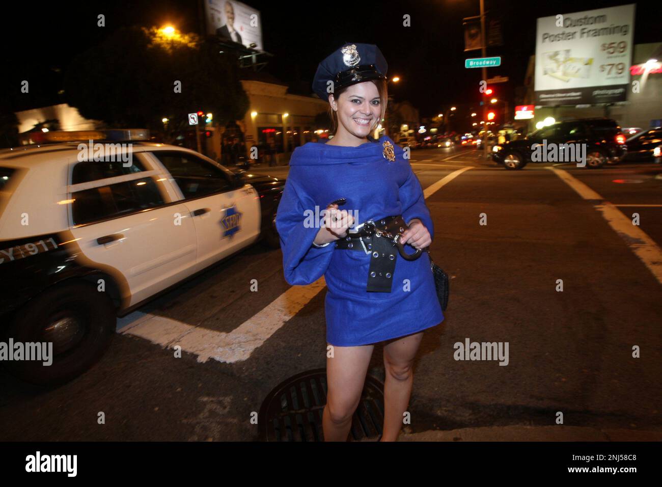 Nuria Santamaria a Stanford grad at the Snuggie pub crawl where a bunch of people meeting up in their wearable fleece blankets are making their way to Shanghai Kelly s in San Francisco