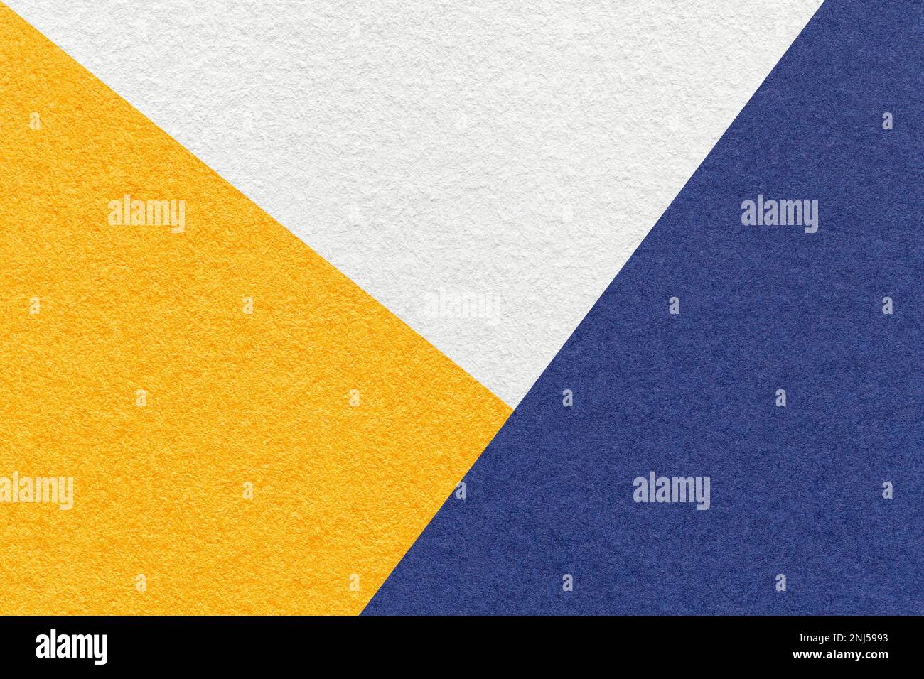 Texture of craft white, yellow and navy blue shade color paper