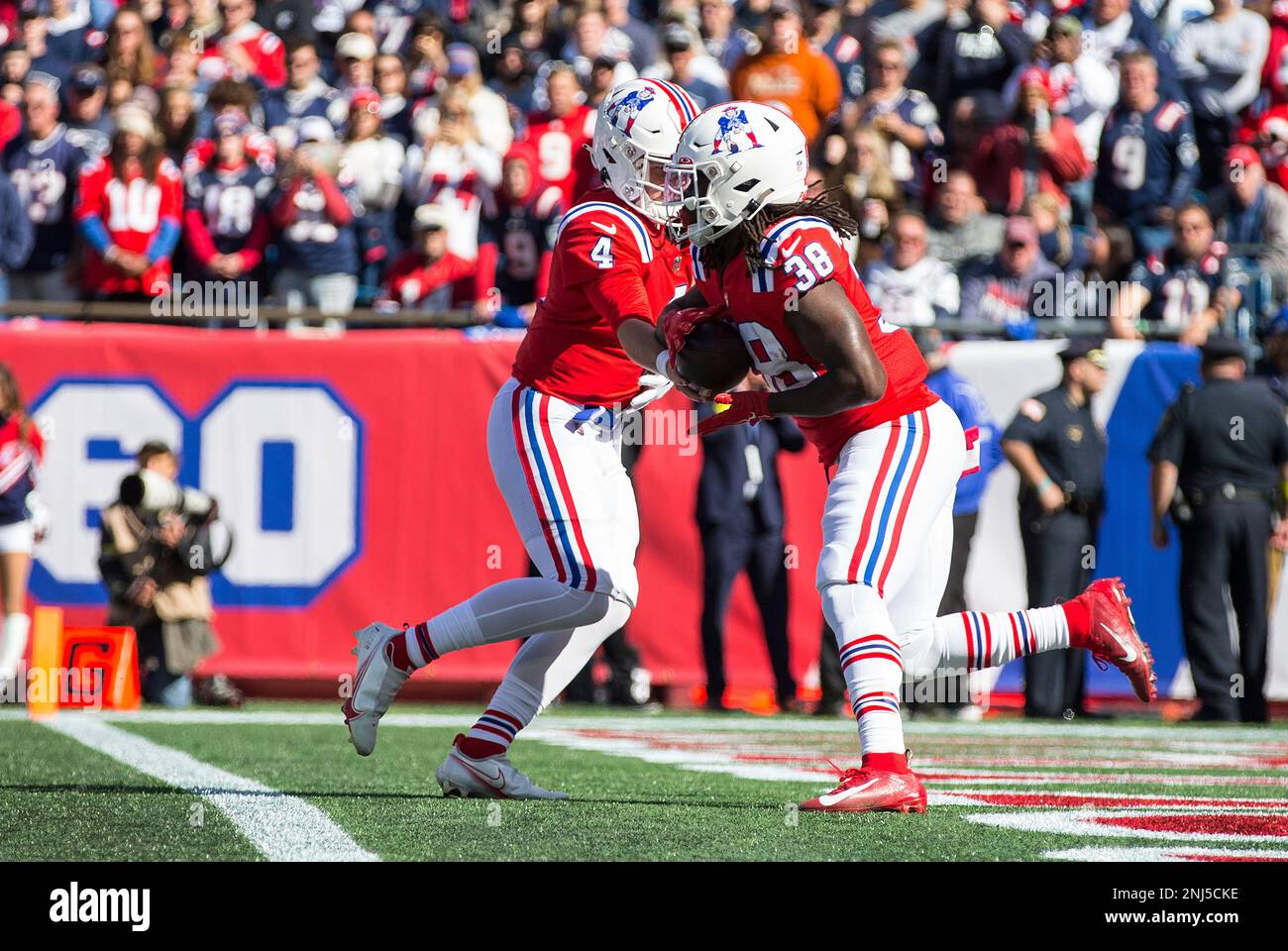 FOXBOROUGH, MA - OCTOBER 09: New England Patriots running back Rhamondre  Stevenson (38) runs with the ball during a NFL game between Detroit Lions  and New England Patriots on October 9, 2022