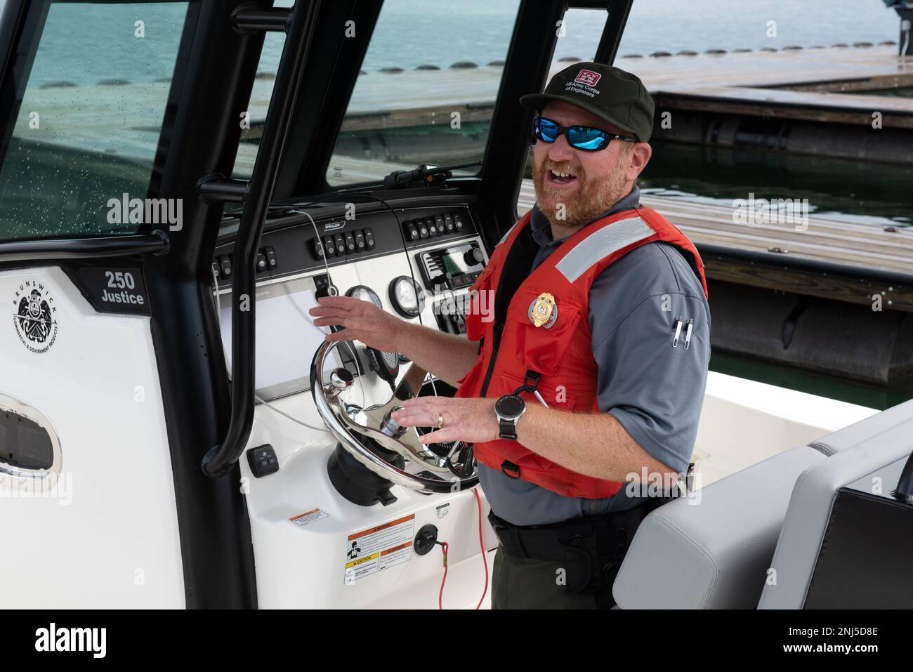 Resource Manager Jonathan Friedman stands at the controls of the lake staff’s new patrol boat on
