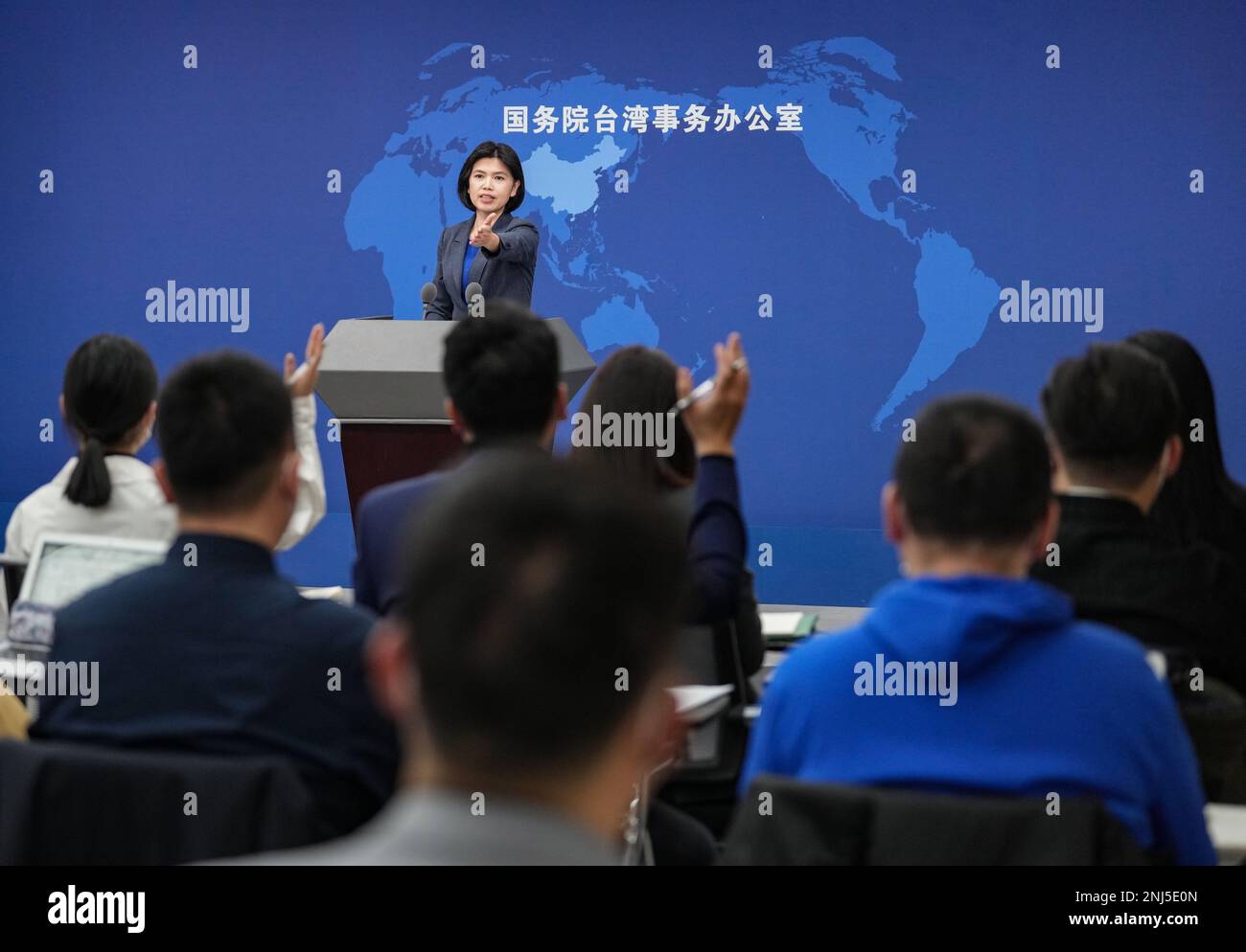 (230222) -- BEIJING, Feb. 22, 2023 (Xinhua) -- Zhu Fenglian, spokesperson for the Taiwan Affairs Office of the State Council, gestures at a press conference in Beijing, capital of China, Feb. 22, 2023.  The Chinese mainland will make utmost efforts to facilitate exchanges across the Taiwan Strait and reduce the costs of such activities, said a mainland spokesperson on Wednesday. (Xinhua/Chen Yehua) Stock Photo