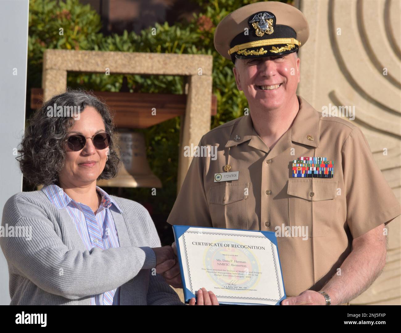 Certificate of Recognition received...Ms. Dora Herman was awarded the Bureau of Medicine and Surgery Financial Management Individual Award in the Budget Execution Category, 2022, which was presented to her by Capt. Patrick Fitzpatrick, Naval Hospital Bremerton director and Navy Medicine Readiness Training Command Bremerton commanding officer, August 5, 2022. The recognition follows Herman also being acknowledged as her command's Senior Civilian of the Year. As financial management analyst, Herman transitioned to the Directorate for Resource Management as the lead budget analyst in May, with ad Stock Photo