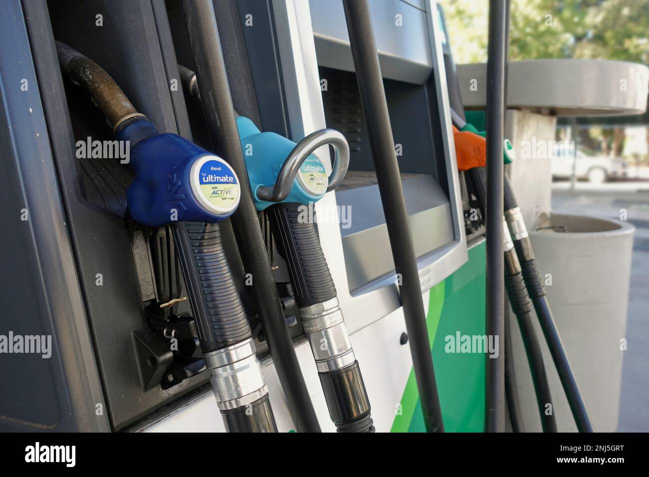 Athens, Greece - December 26, 2022: Gas station gasoline pumps close up with diesel and unleaded fuel for cars. Stock Photo