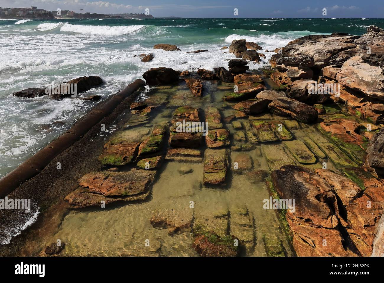 506 Strong waves break on the rocks next to Marine Parade in Manly suburb. Sydney-Australia. Stock Photo