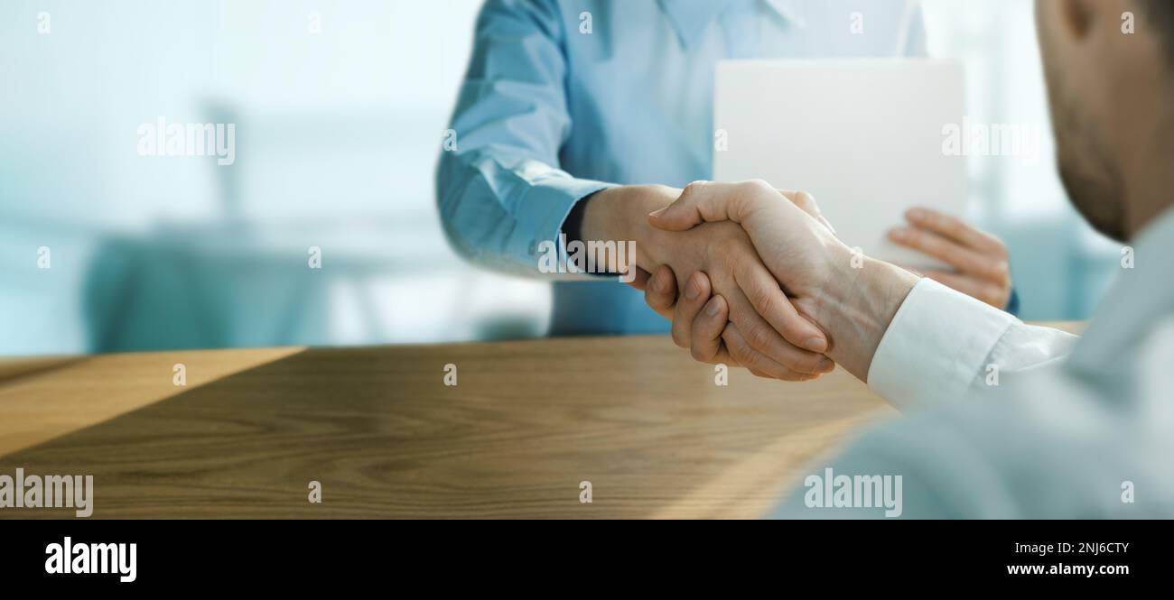 business people handshake in office. businessmen partnership, agreement and cooperation concept. banner with copy space Stock Photo