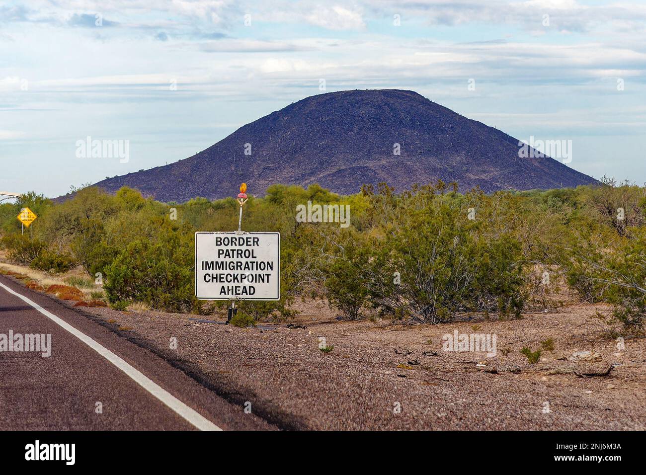 border patrol immigration checkpoint ahead sign in the Arizona desert