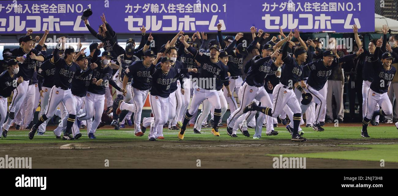 Members of Orix Buffaloes celebrate after winning the Nippon Professional Baseball (NPB) Pacific League at Rakuten